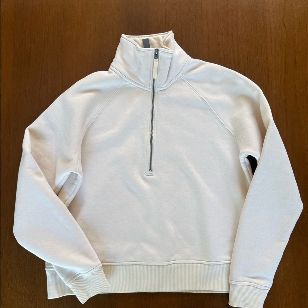 Women’s Vuori half zip sweater. Size small. Color cream